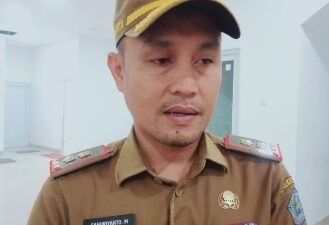 Ket gambar: Kadis Kominfo kota Kendari memberikan klarifikasi( foto)